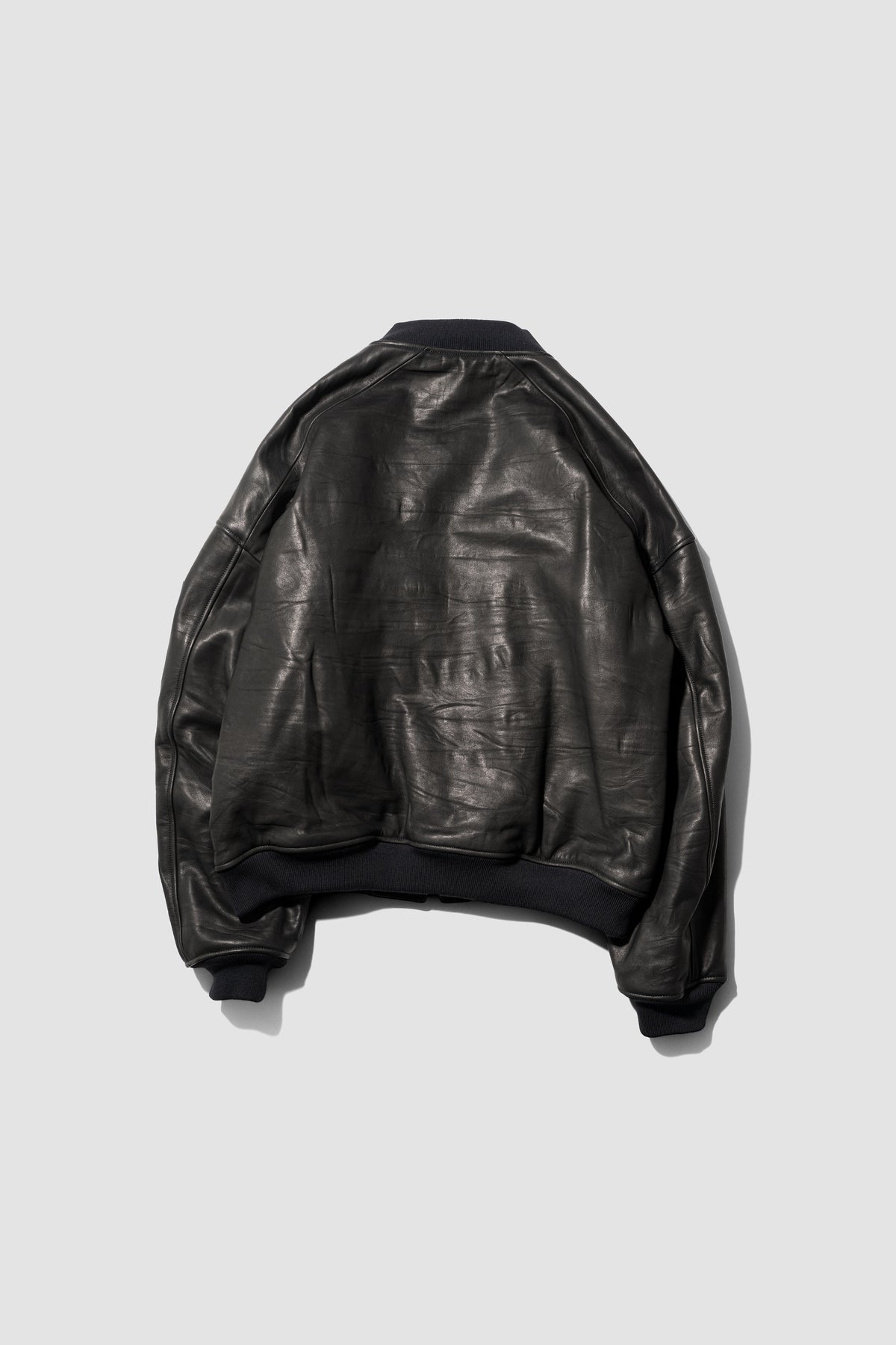 VUJA DÉ / Bale Leather Cocoon Bomber in Calfskin "Black"