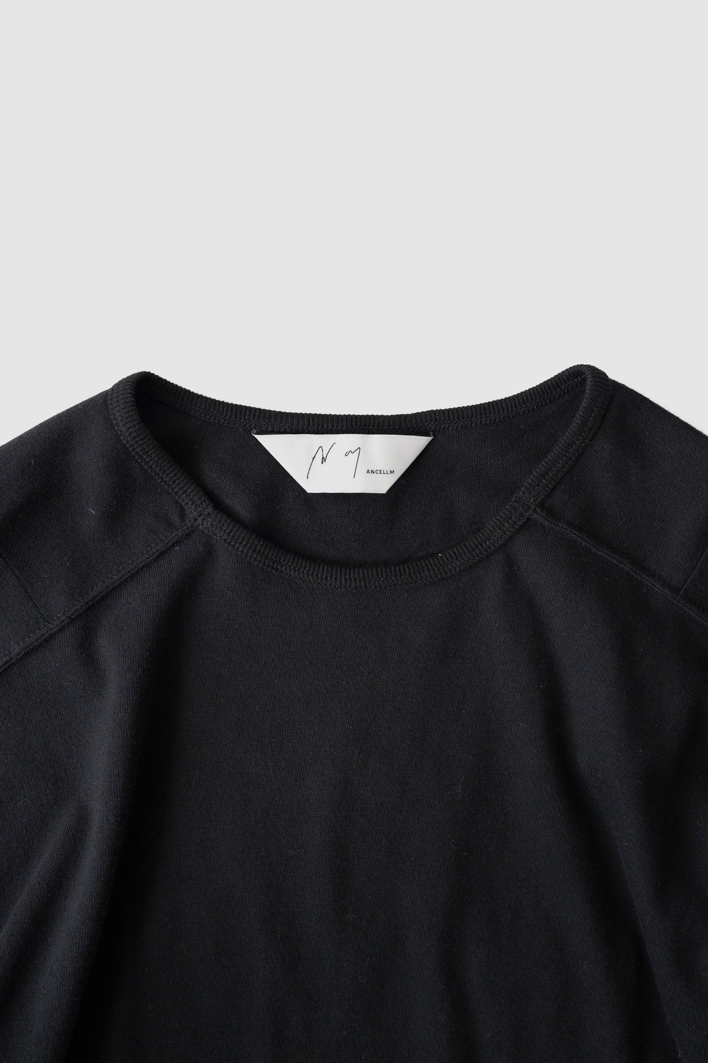 ANCELLM / C/R LS T-SHIRT "BLACK"