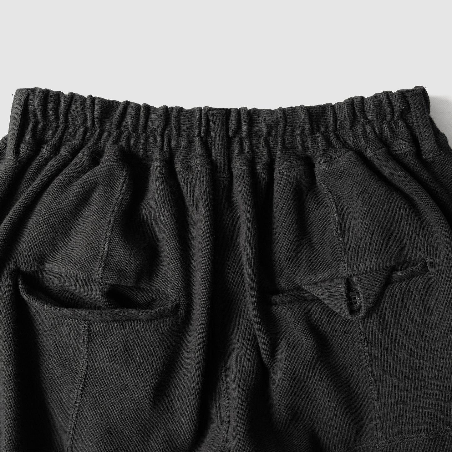 ANCELLM / SWITCHING SMOOTH KNIT PANTS "BLACK"