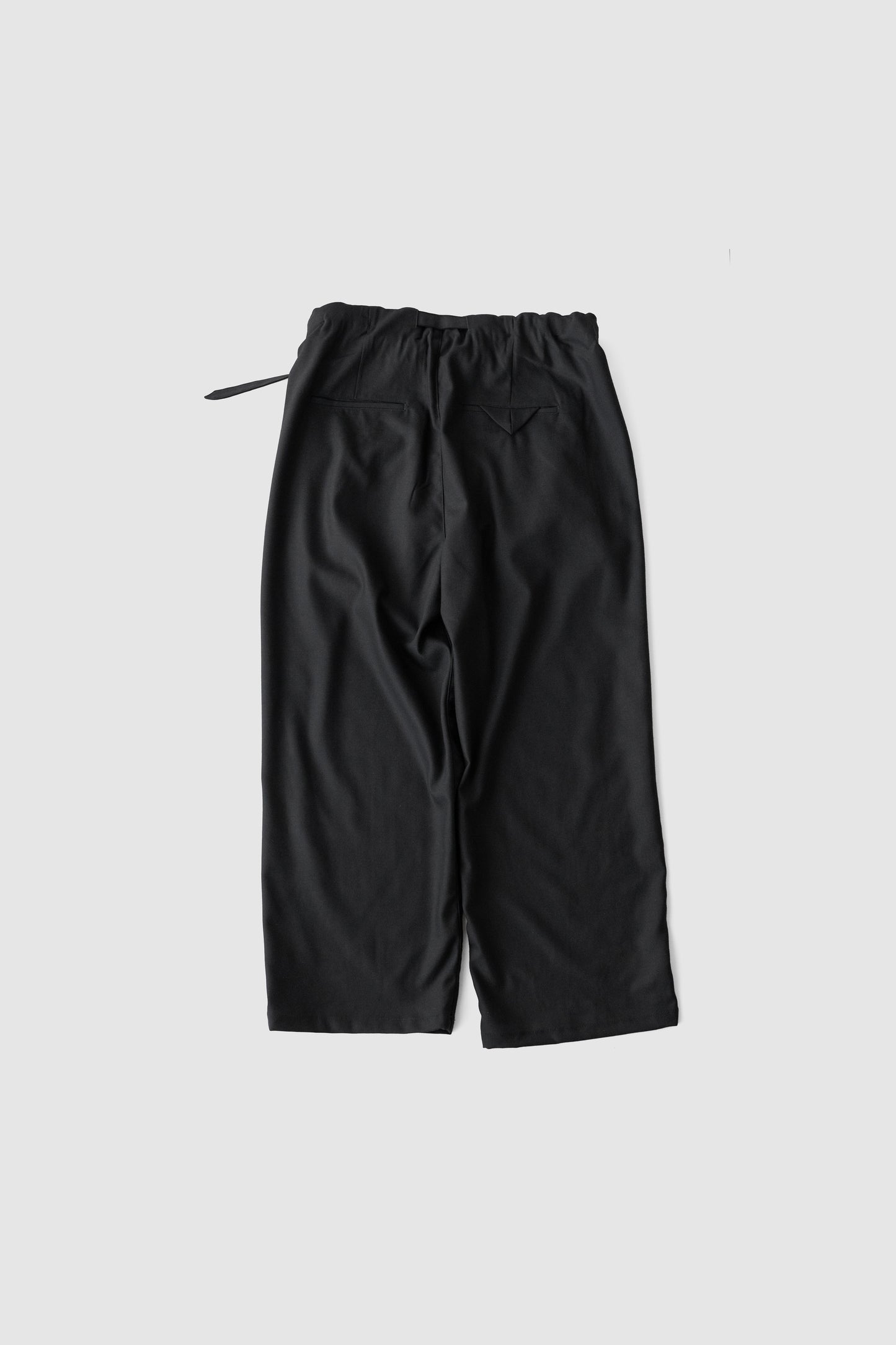 ANCELLM / WOOL SATIN BELT-LESS SLACKS "BLACK"