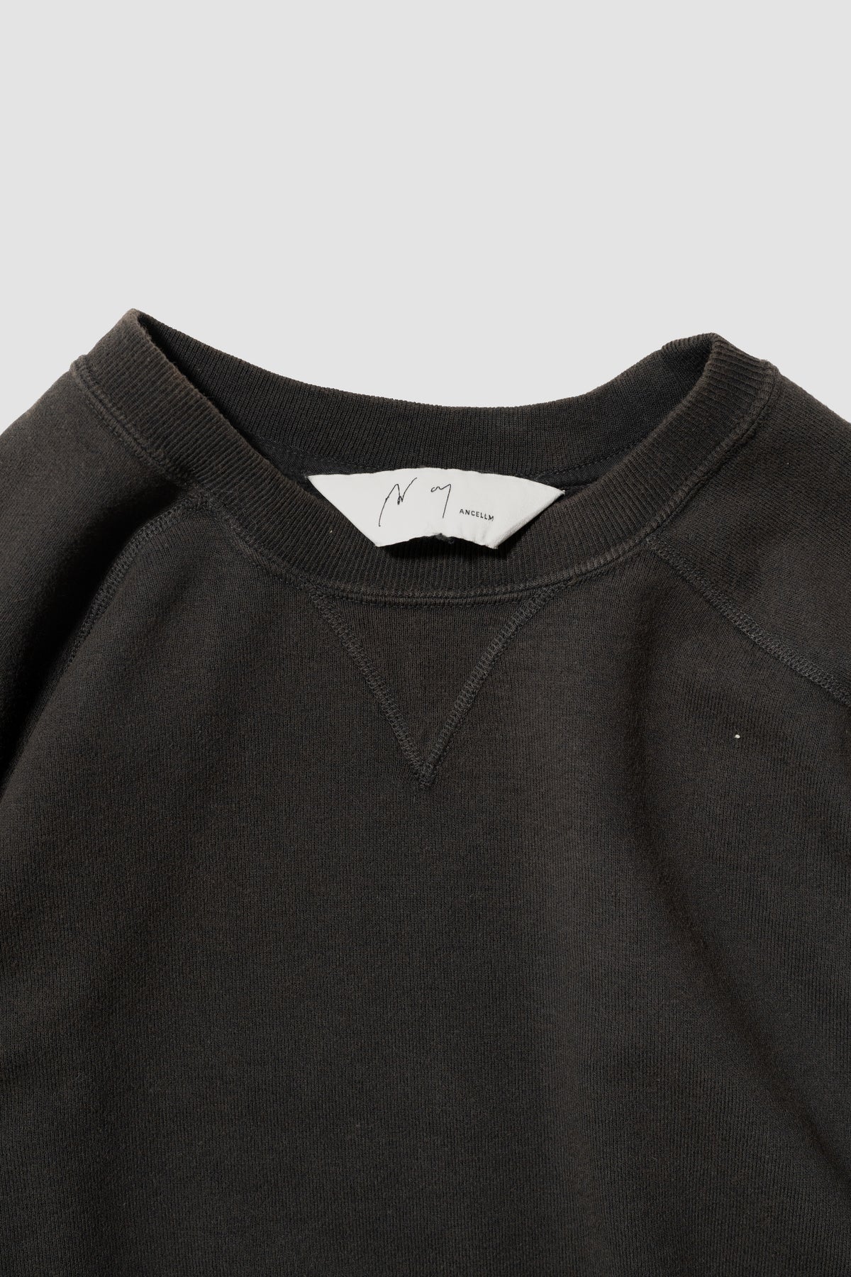ANCELLM / FLEECE-LINED SWEAT SHIRT "BLACK"