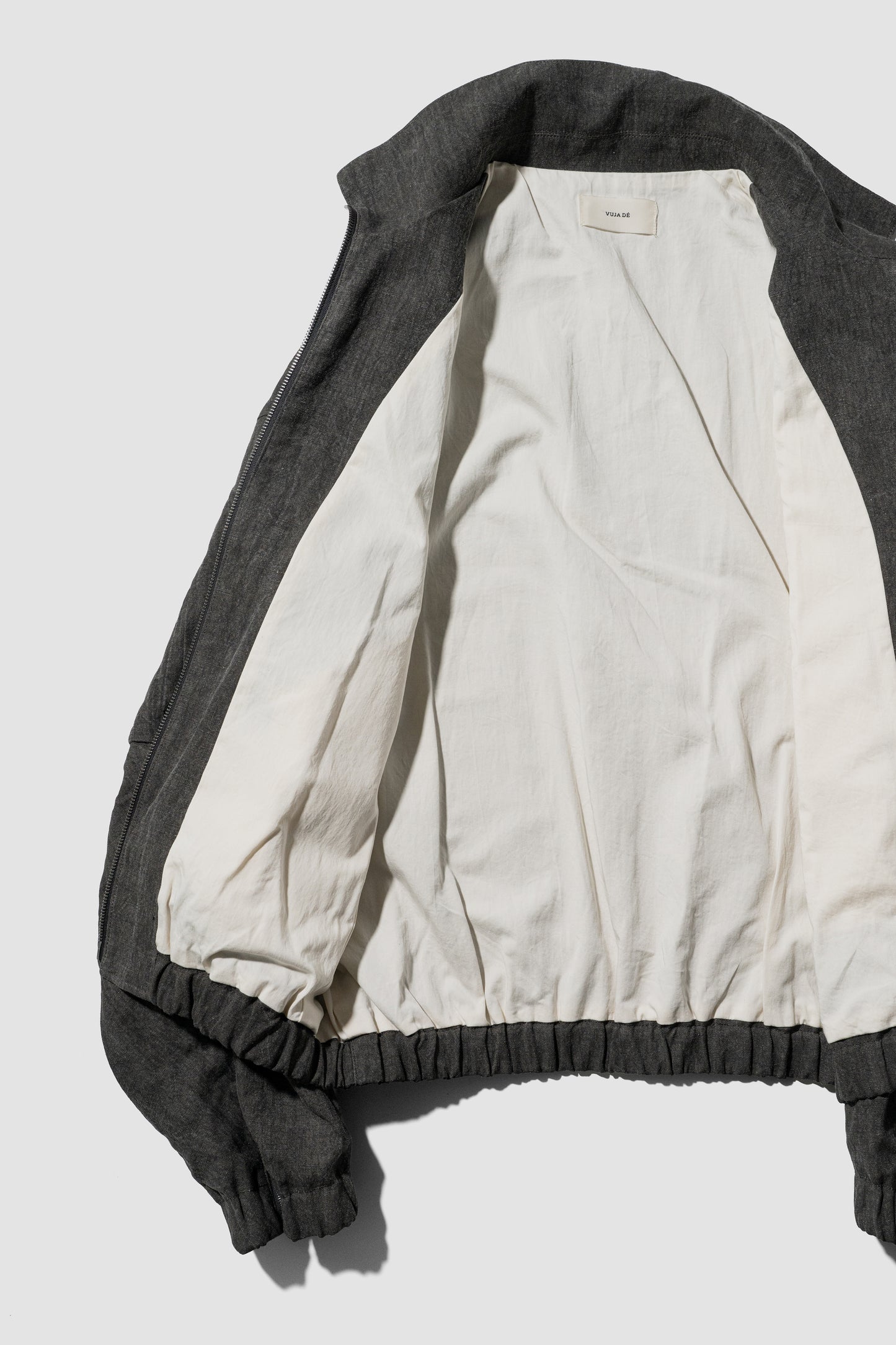 VUJA DÉ / Kira Drape Blouson in Sumi-Dyed Linen "Grey"