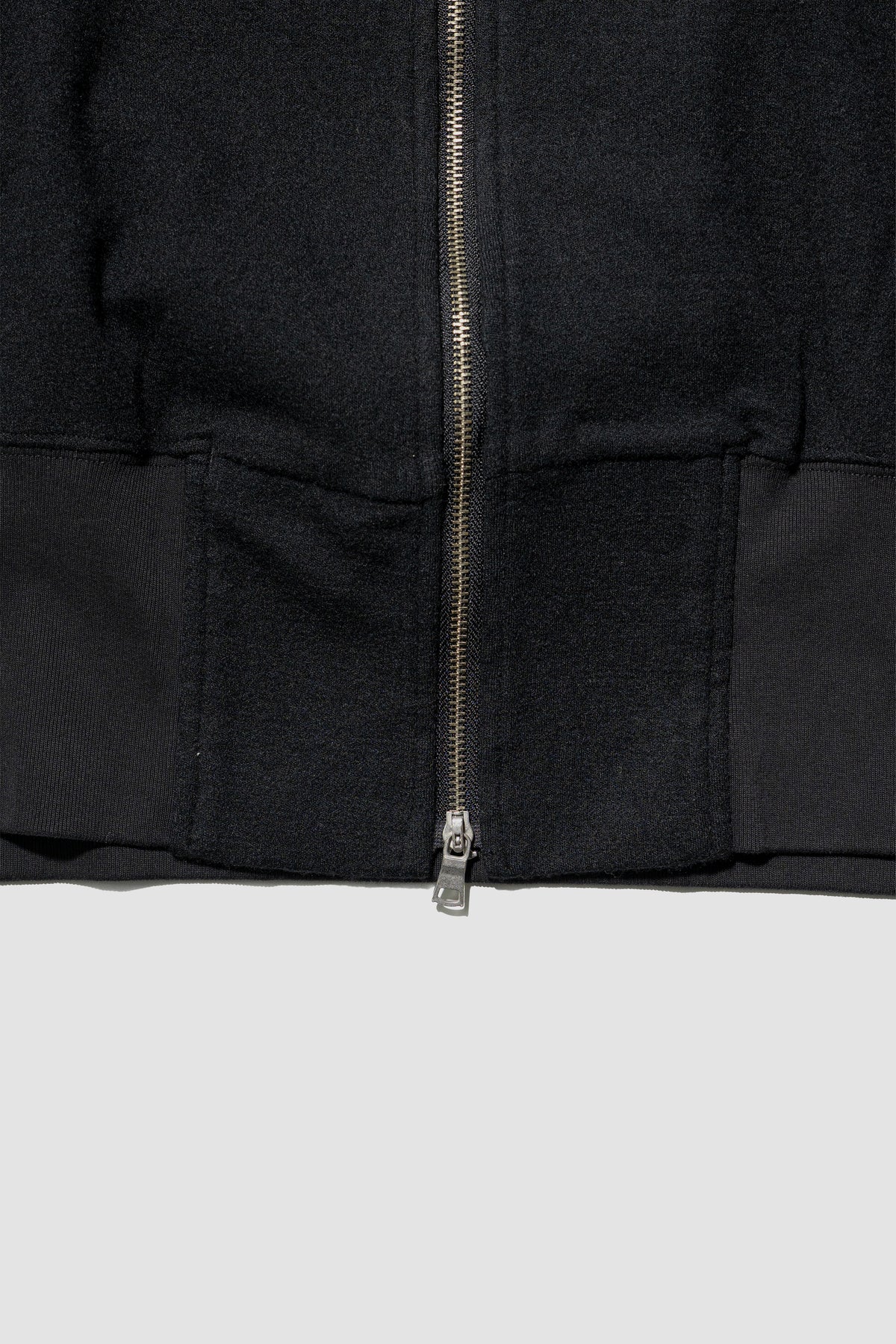 ANCELLM / SHRINK WOOL ZIP UP STAND BLOUSON "BLACK"