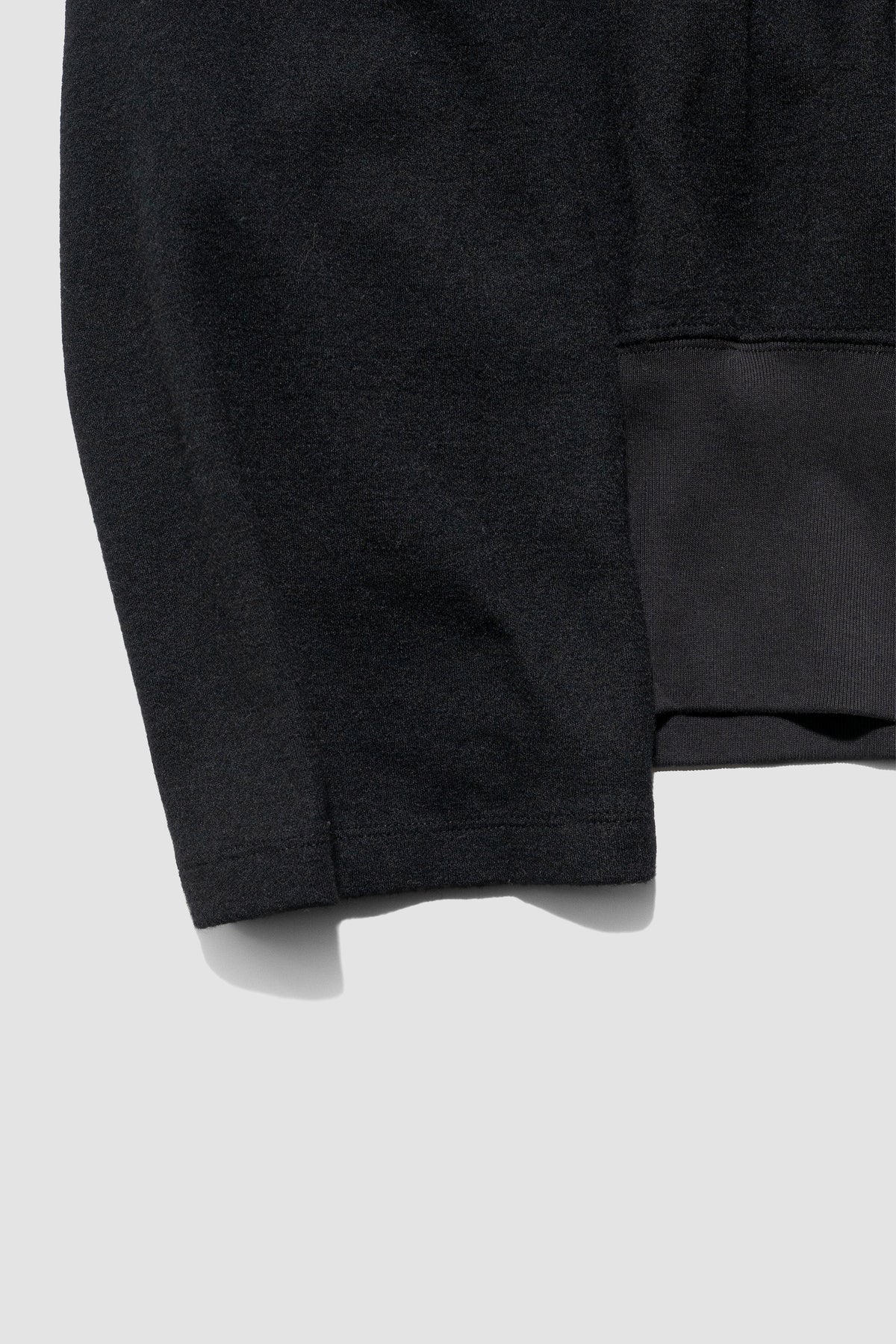 ANCELLM / SHRINK WOOL ZIP UP STAND BLOUSON "BLACK"