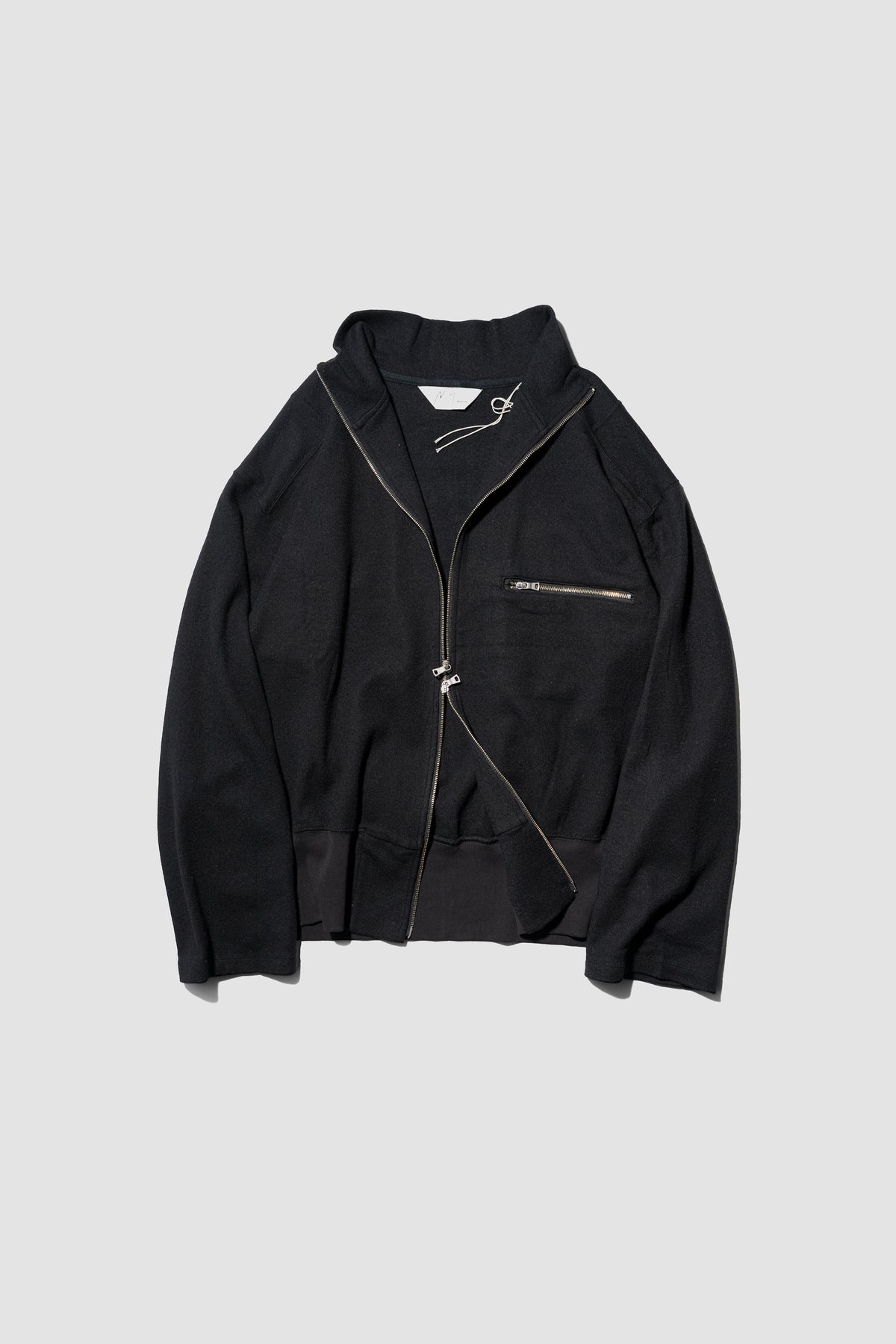 ANCELLM / SHRINK WOOL ZIP UP STAND BLOUSON "BLACK"