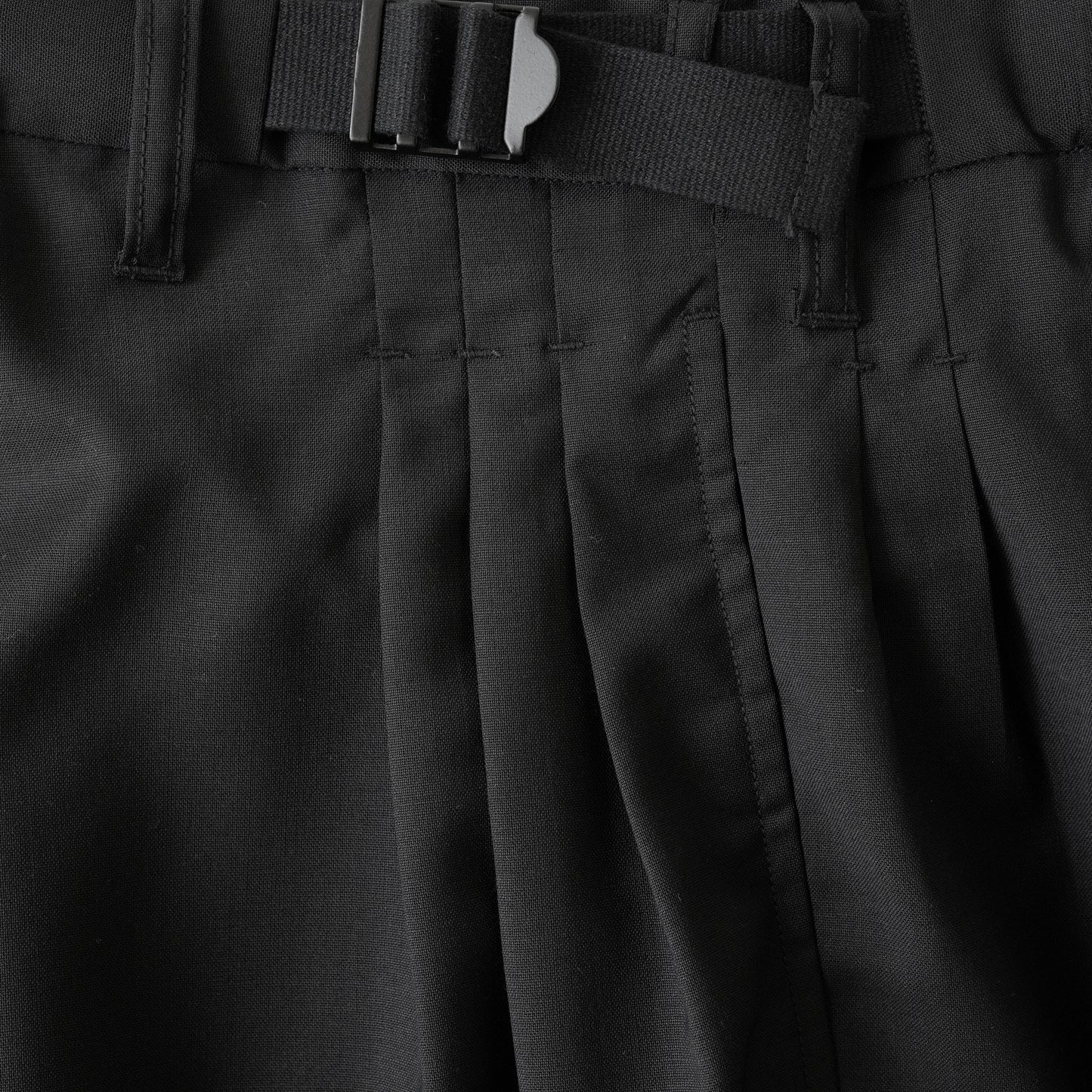 ANCELLM / BELTED WOOL SLACKS "BLACK"