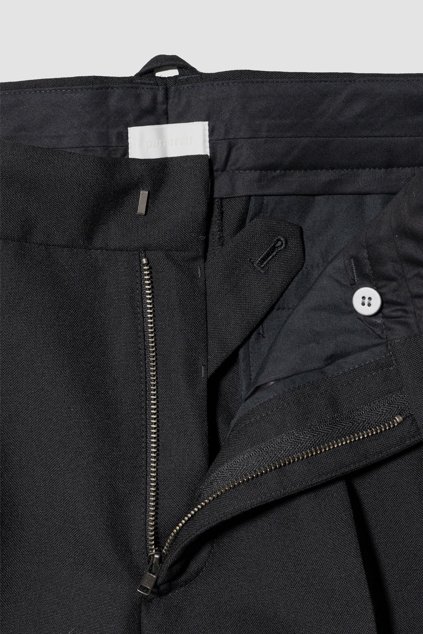 paratrait/ WOOL NONKE SLACKS "BLACK"
