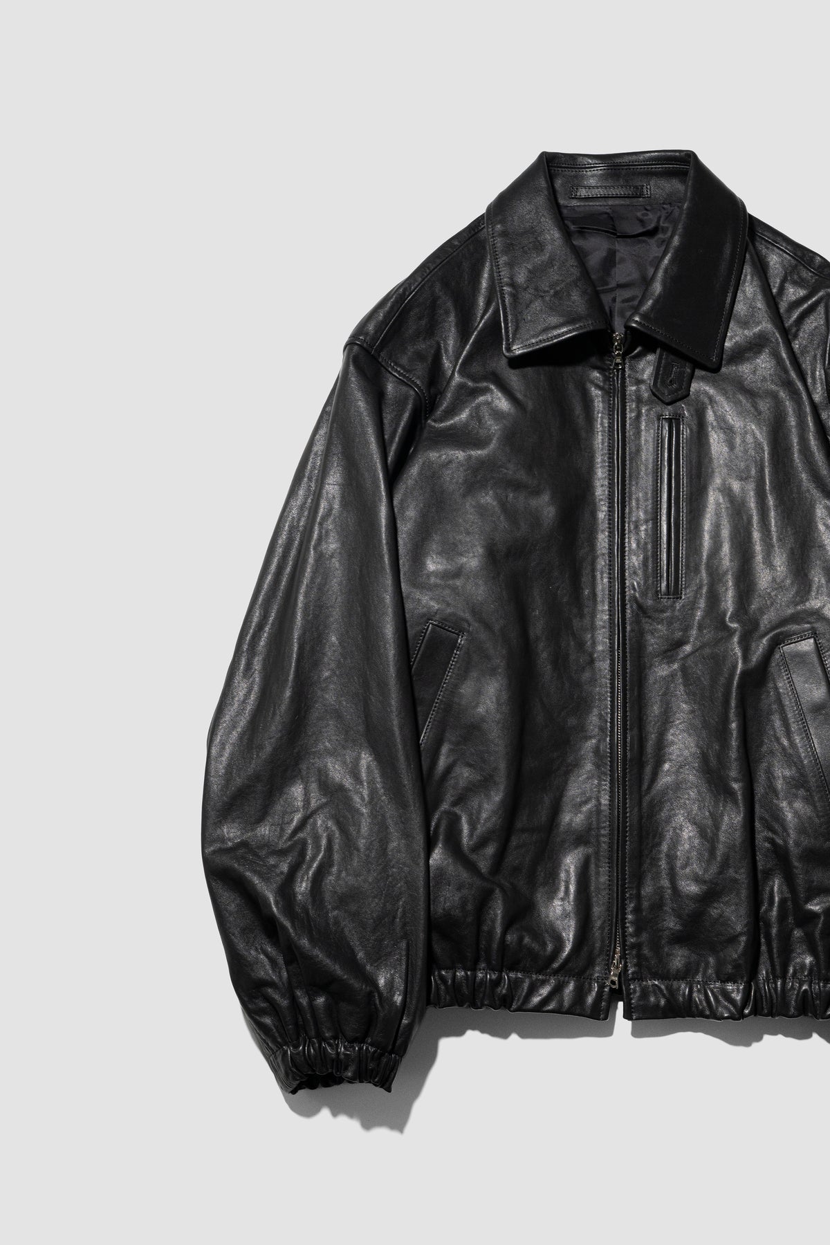 ssstein/ CALF ZIP SHORT JACKET "BLACK"