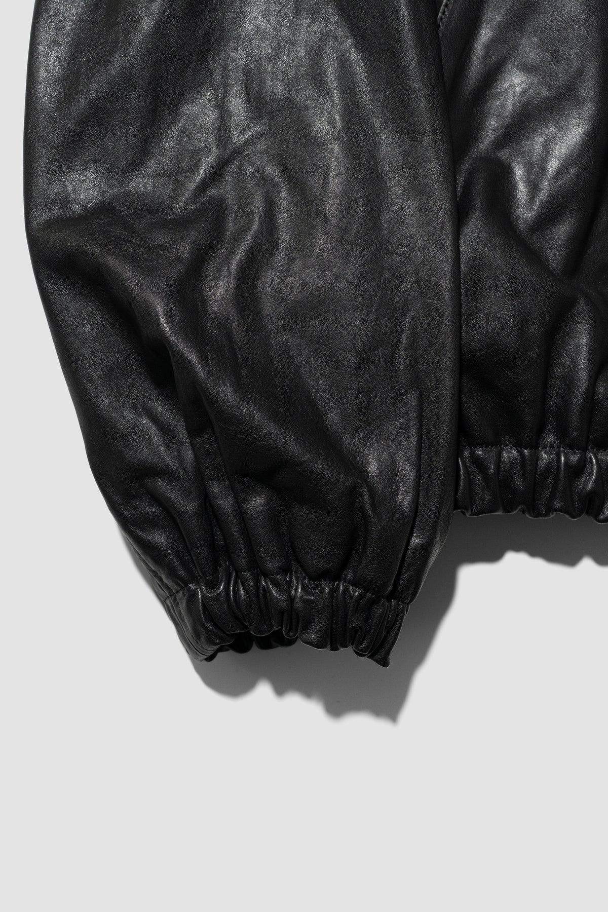 ssstein/ CALF ZIP SHORT JACKET "BLACK"