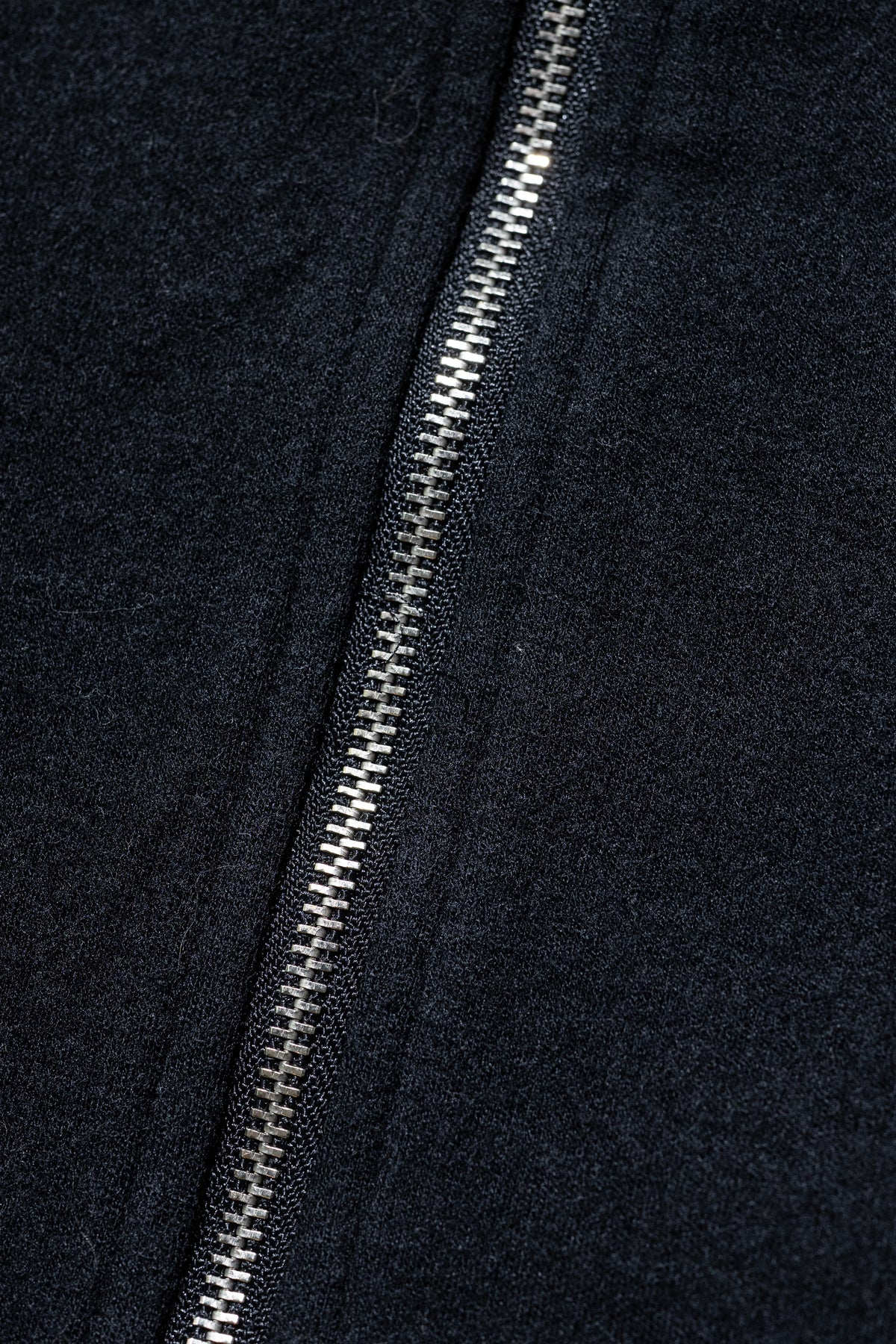 ANCELLM / SHRINK WOOL ZIP UP STAND BLOUSON "BLACK"
