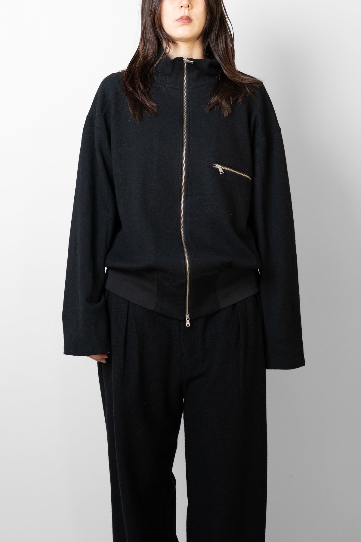 ANCELLM / SHRINK WOOL ZIP UP STAND BLOUSON "BLACK"