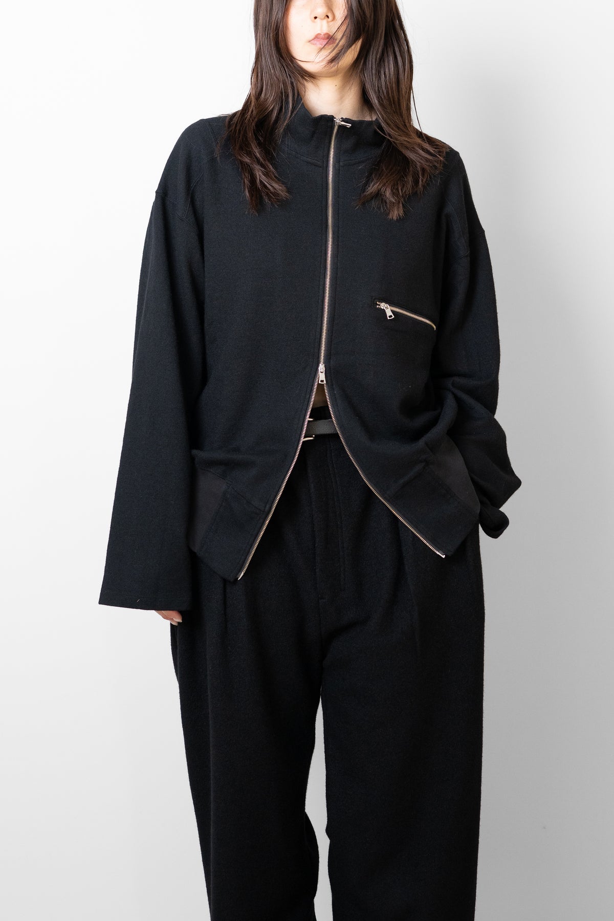 ANCELLM / SHRINK WOOL ZIP UP STAND BLOUSON "BLACK"