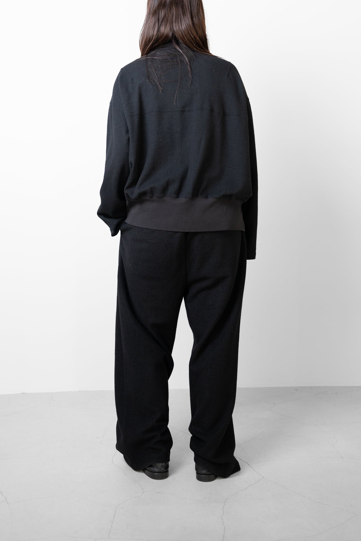ANCELLM / SHRINK WOOL ZIP UP STAND BLOUSON "BLACK"
