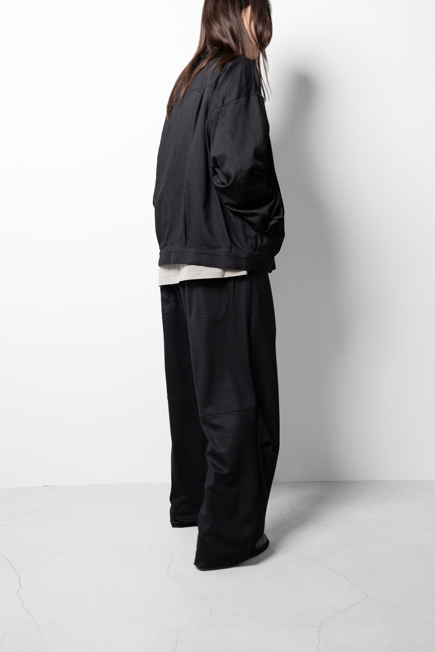 ANCELLM / WOOL CUT KNEE TUCK SLACKS "BLACK"