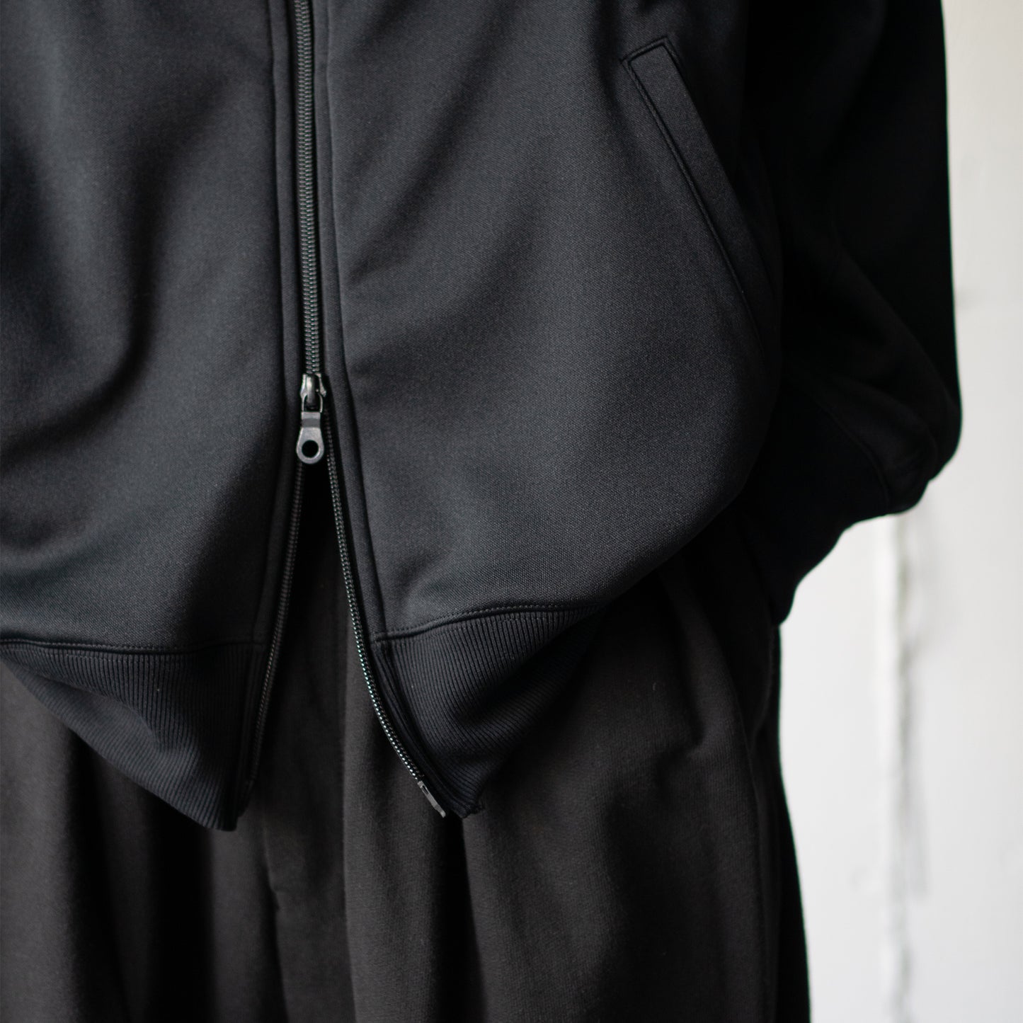 ANCELLM / DRIVERS TRACK JACKET "BLACK"