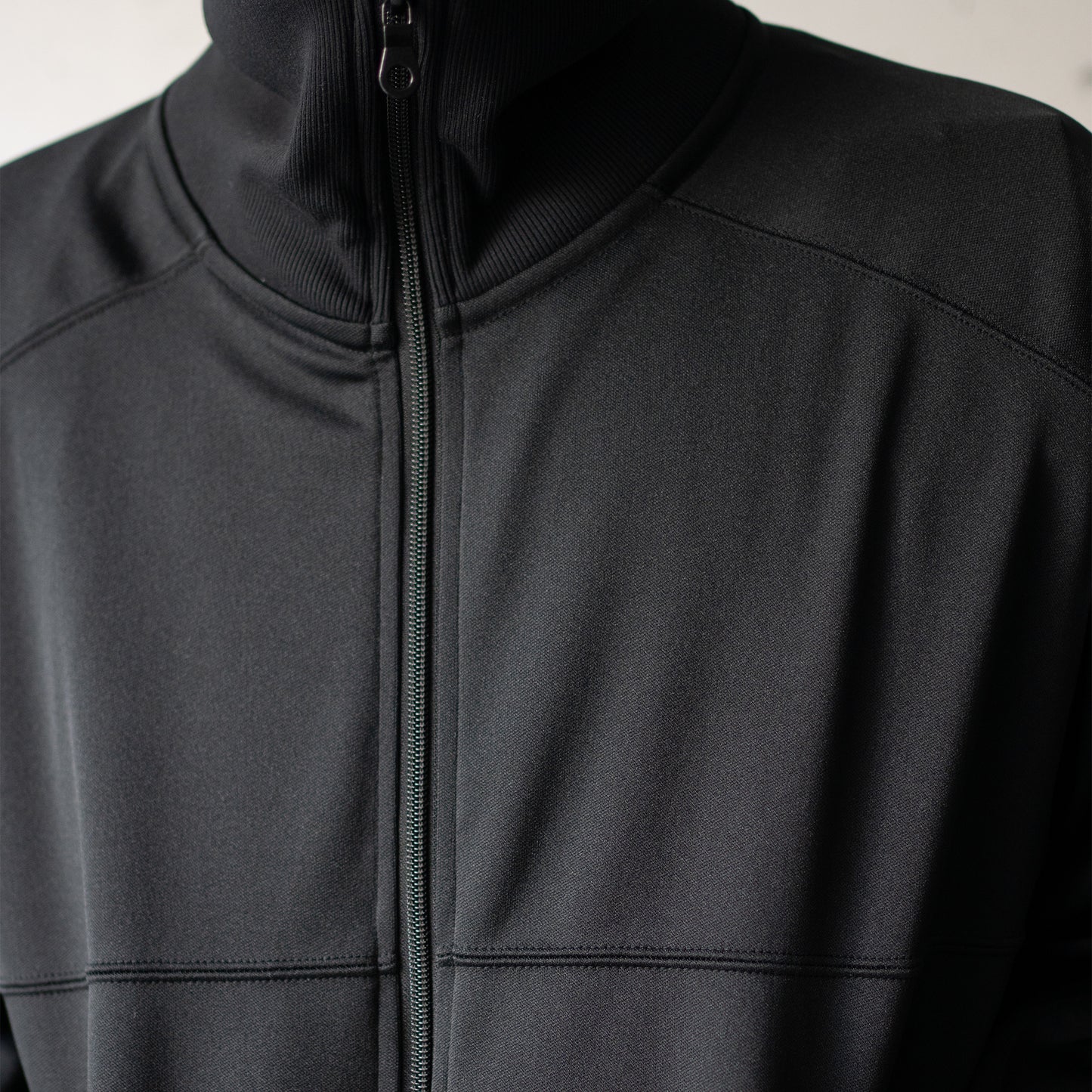 ANCELLM / DRIVERS TRACK JACKET "BLACK"