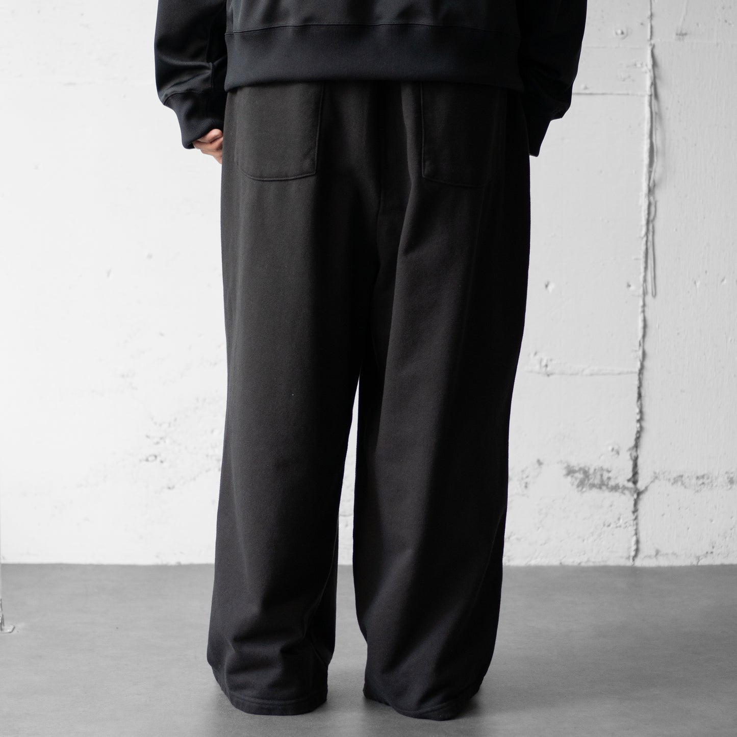 ANCELLM / TUCK SWEAT PANTS "BLACK"