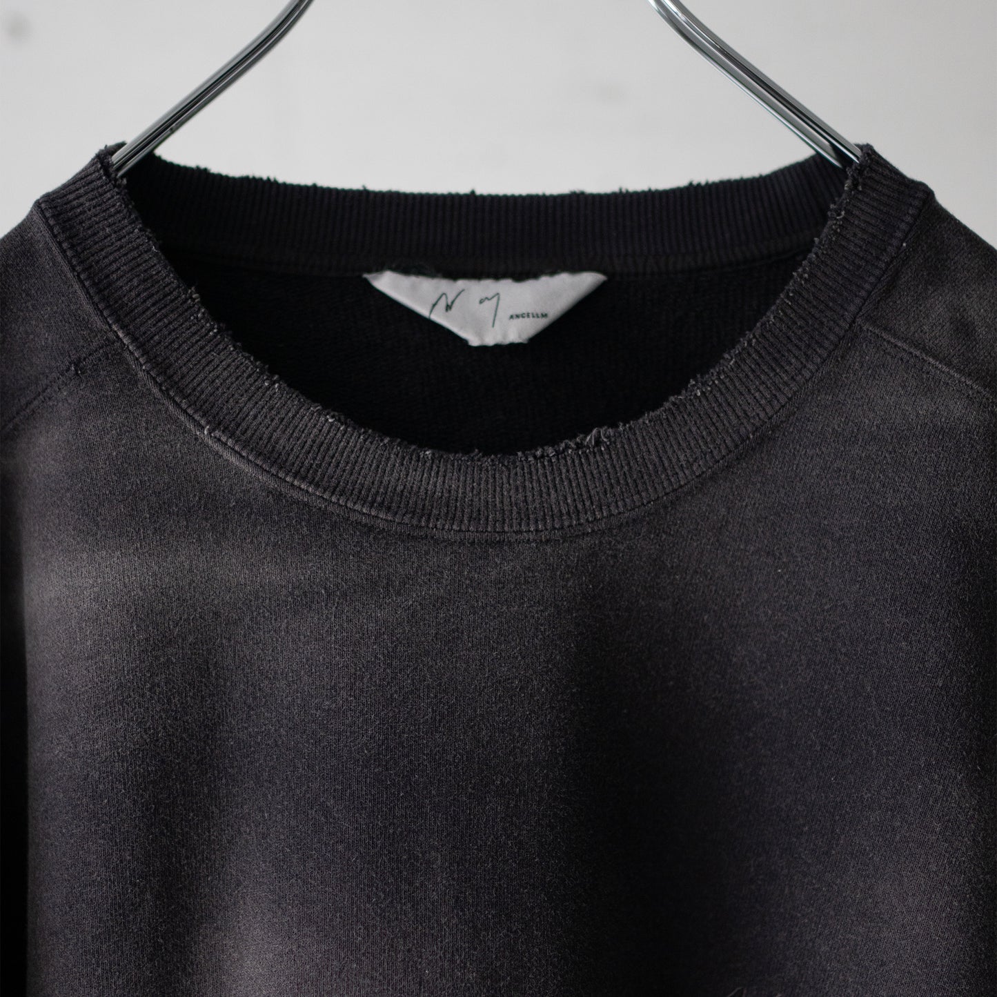 ANCELLM / UNEVENNESS SWEAT SHIRT "BLACK"