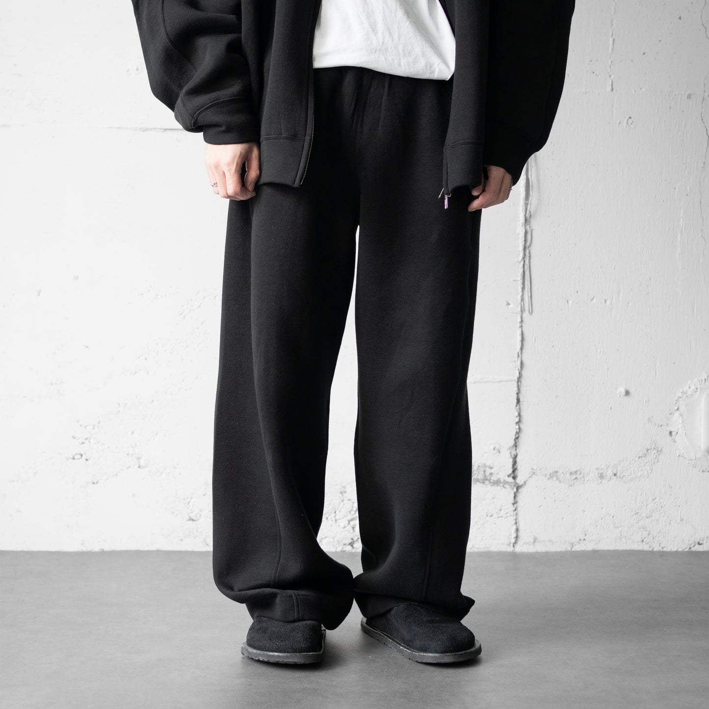 ssstein/ COTTON DOUBLE KNIT TWIST SEAM PANTS "BLACK"