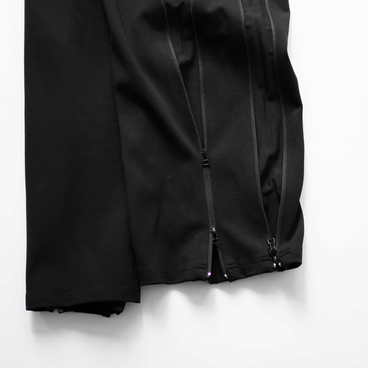 ROTOL/ DOUBLE ZIP TRACK PANTS "BLACK"