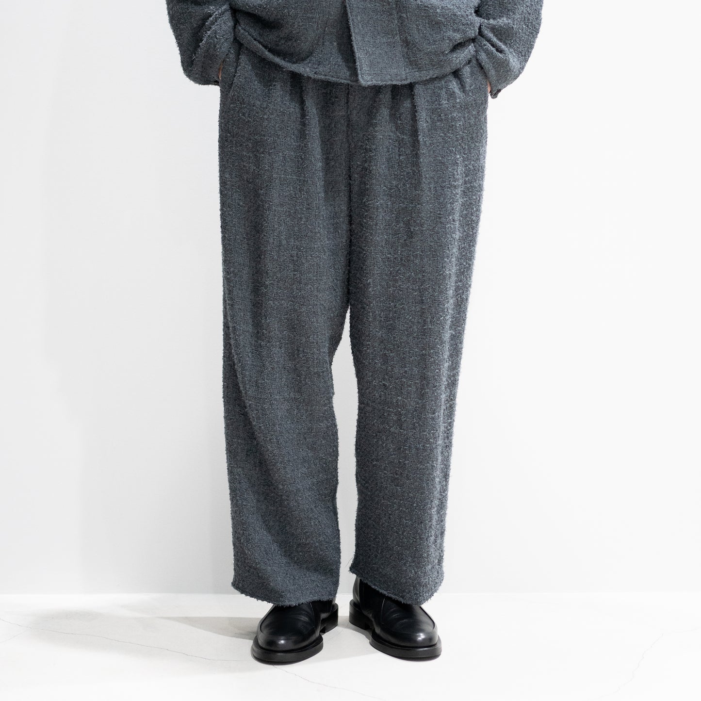 nonnotte/ Draping Elastic In Tuck Wide Trousers "Charcoal Top"