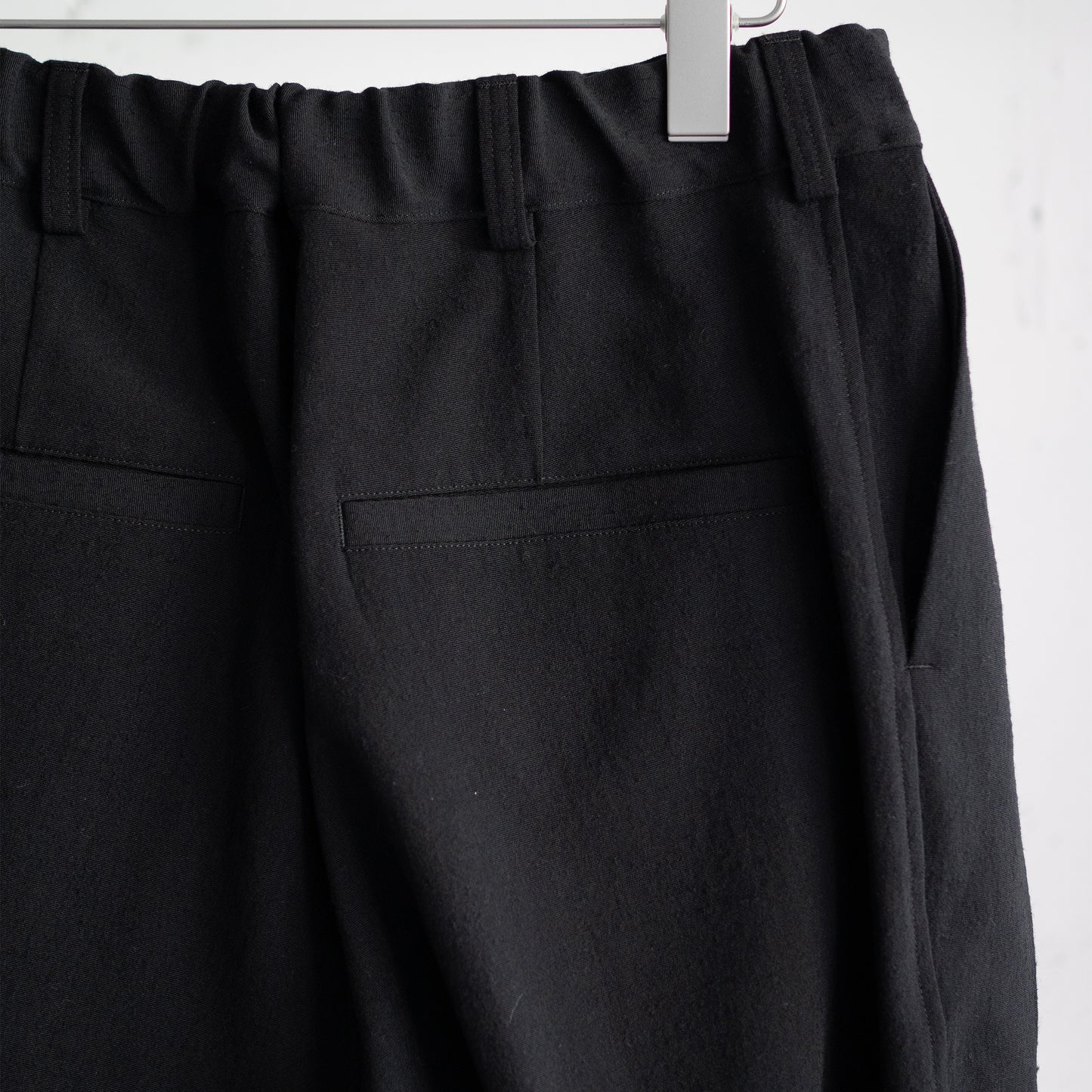 kontor/ 3 PLEAT WOOL PANTS "BLACK"