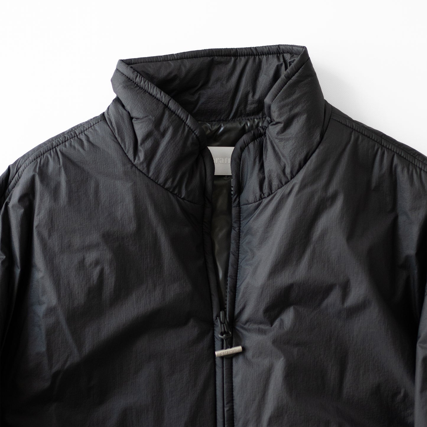 paratrait/ MEMBRANE SHELL PUFF BLOUSON "BLACK"