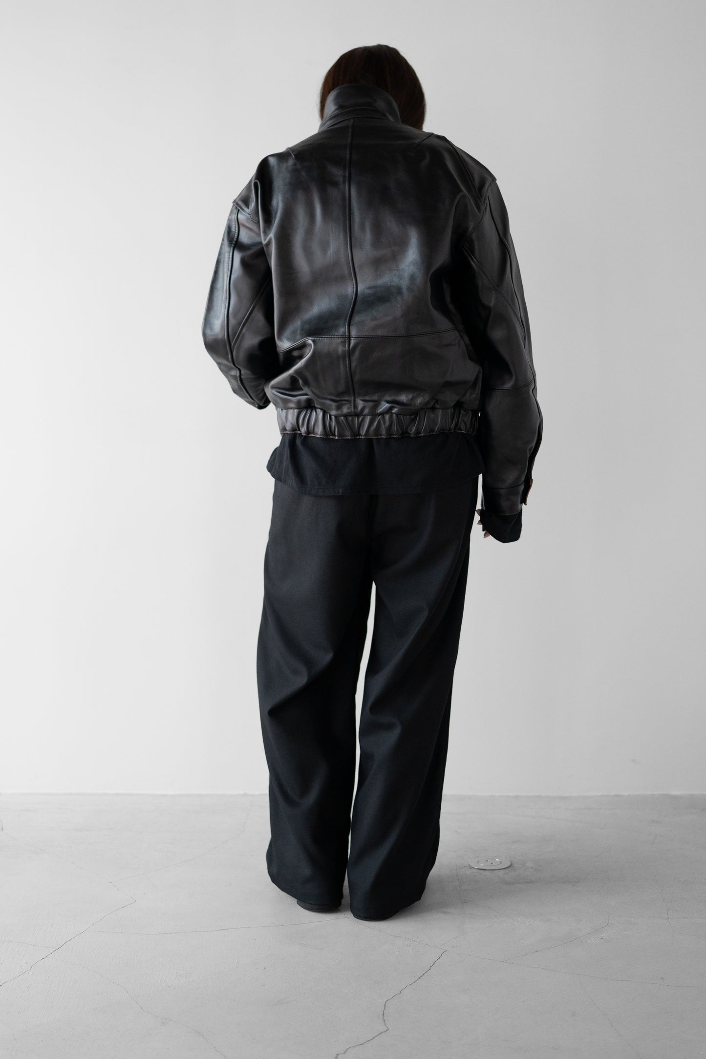 ANCELLM / WOOL SATIN BELT-LESS SLACKS "BLACK"