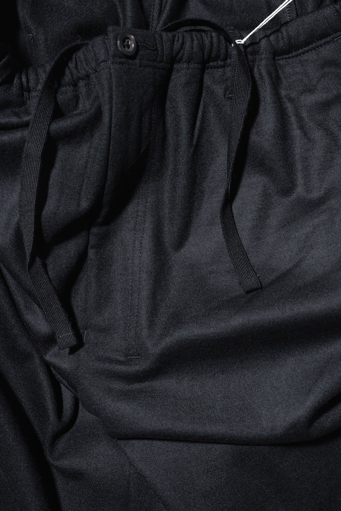 ANCELLM / WOOL CUT KNEE TUCK SLACKS "BLACK"